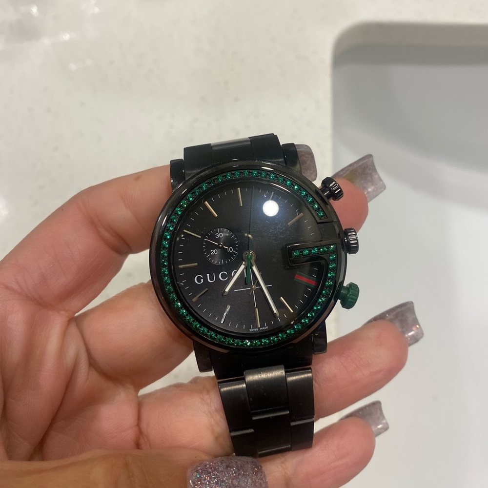 Gucci watch with green genuine diamonds